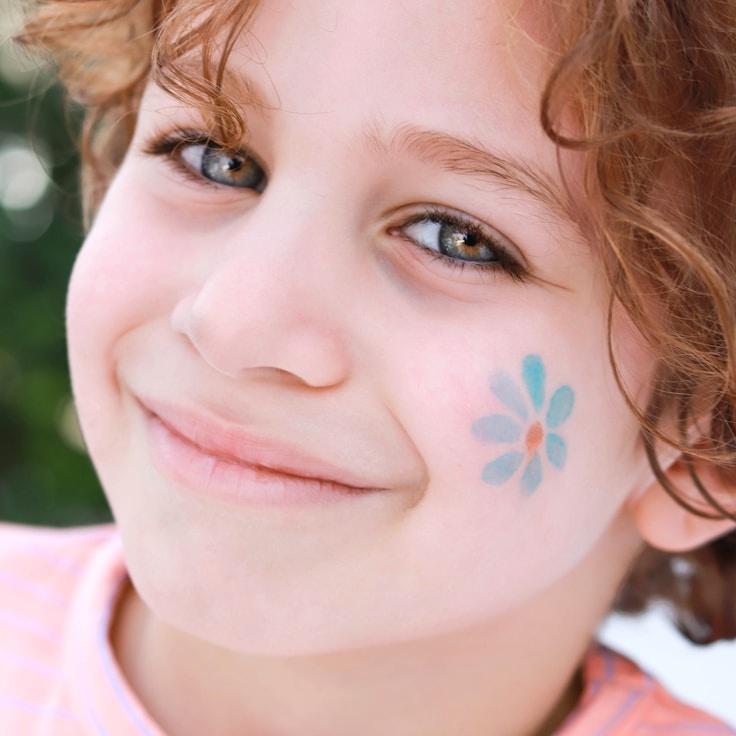 Alex Carter, Lead Design Curator at Golden Meadow Alliance, reviewing corporate floral arrangements